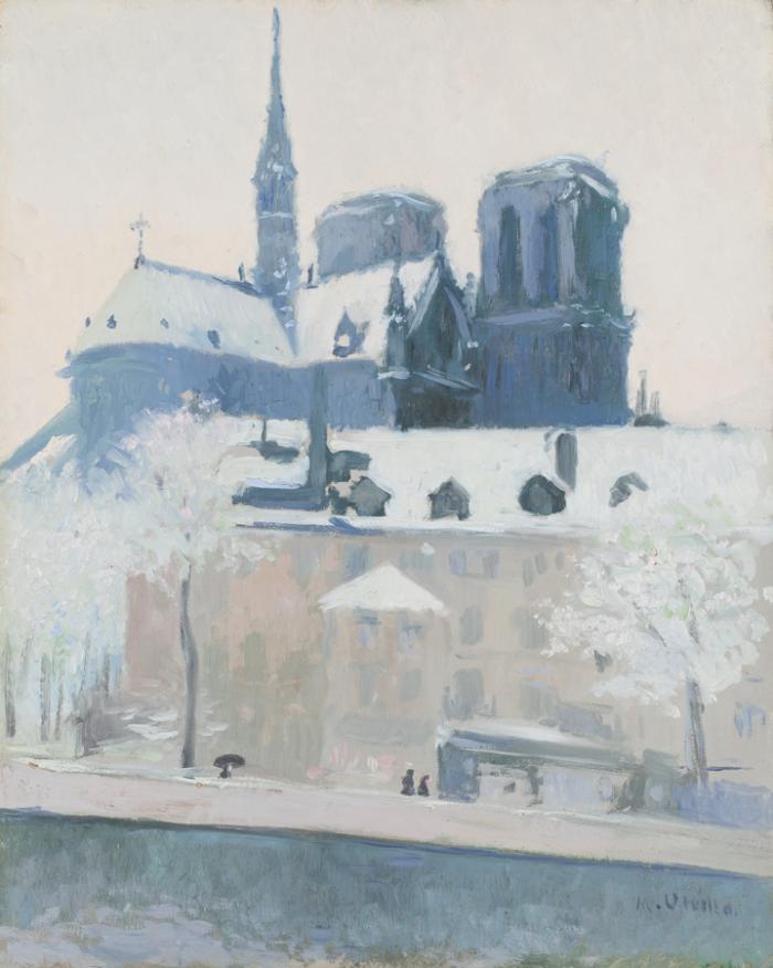 Vista de l'absis de Notre Dame de París, sota la neu